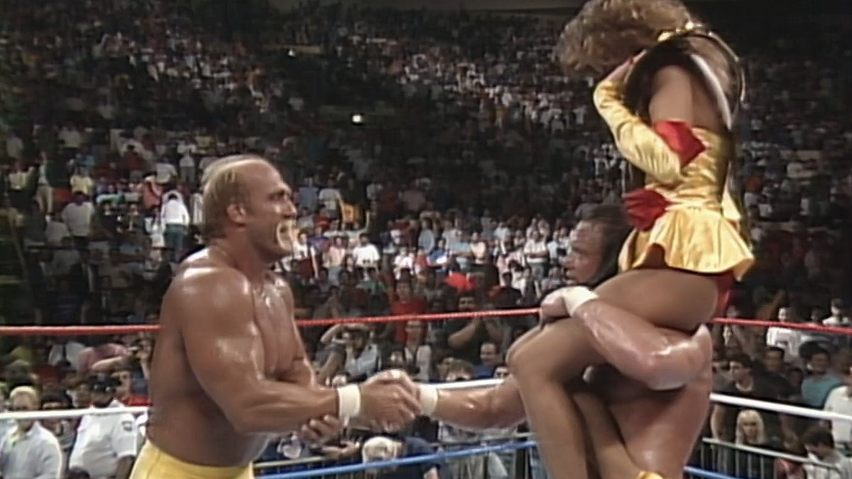 Hulk Hogan, Elizabeth and Randy Savage celebrate their SummerSlam victory. Courtesy: WWE.