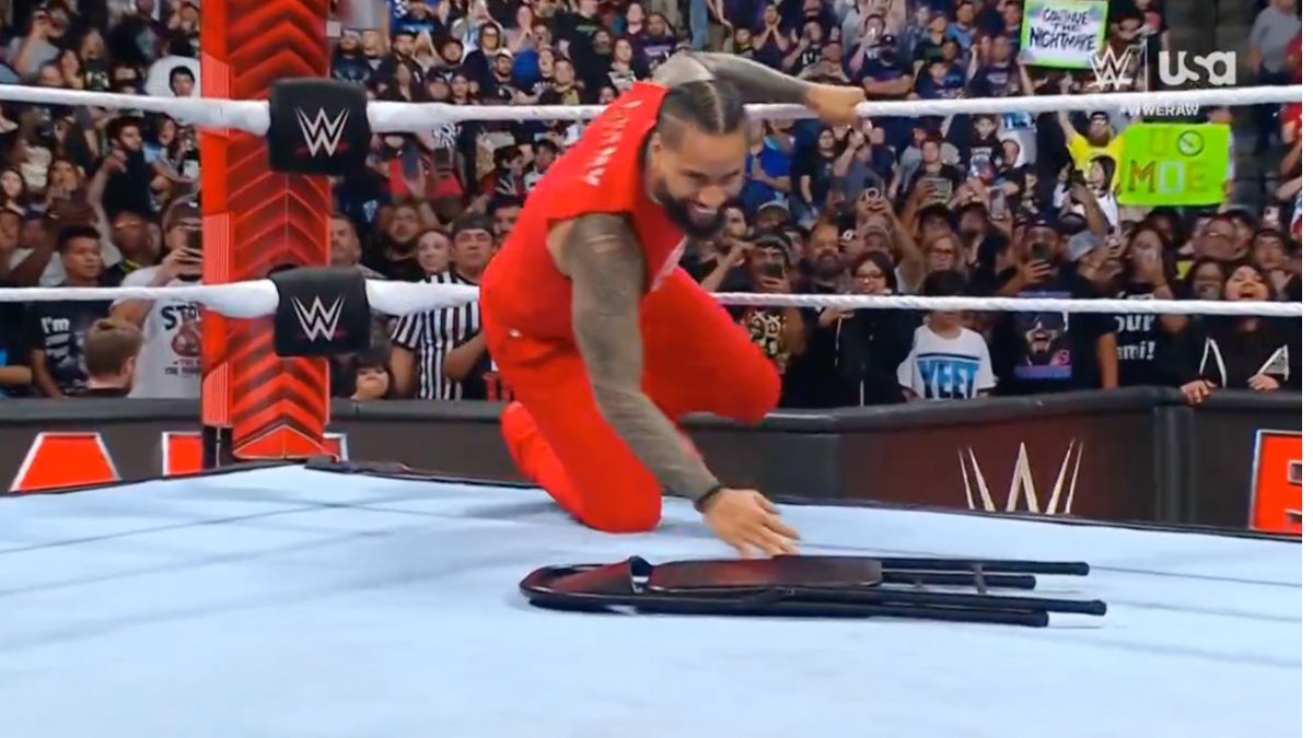 Jimmy Uso stalking his prey, Jey Uso.