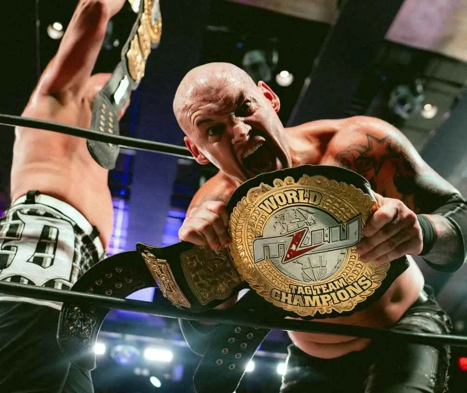 Bishop Dyer and Dijak hold up their newly-won MLW Tag Team Titles. Photo courtesy of MLW.