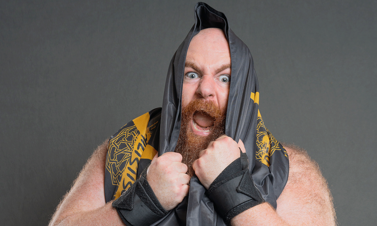Big Damo with a Contra Unit flag around his head. Photo courtesy of MLW.